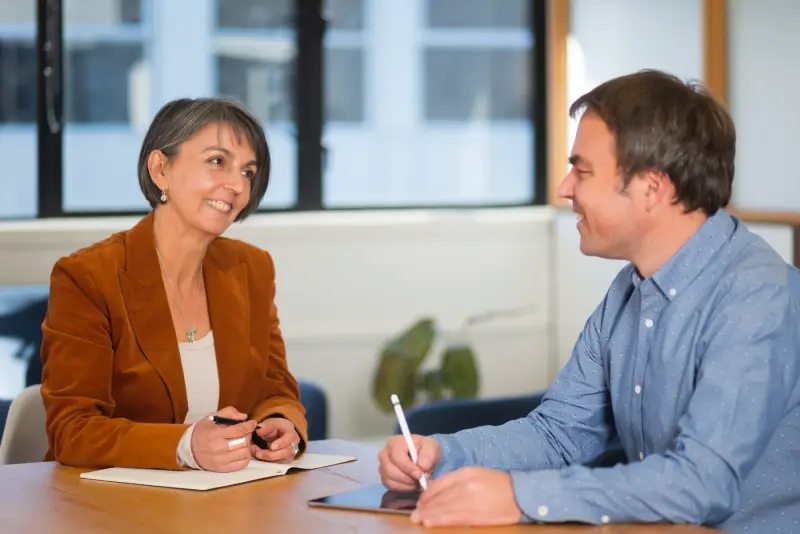 Brendyn having a website strategy meeting with a client.